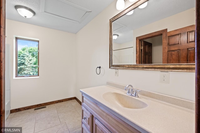 2117 Oakridge St, Saint Paul, MN 55119 - full bathroom featuring vanity and tile patterned floors