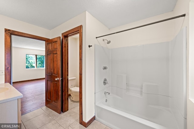 2117 Oakridge St, Saint Paul, MN 55119 - bathroom featuring shower / tub combination, vanity, and tile patterned floors