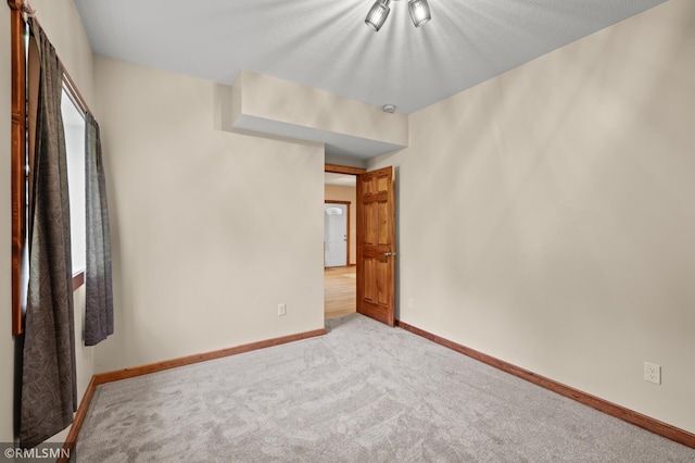 2117 Oakridge St, Saint Paul, MN 55119 - carpeted spare room featuring baseboards