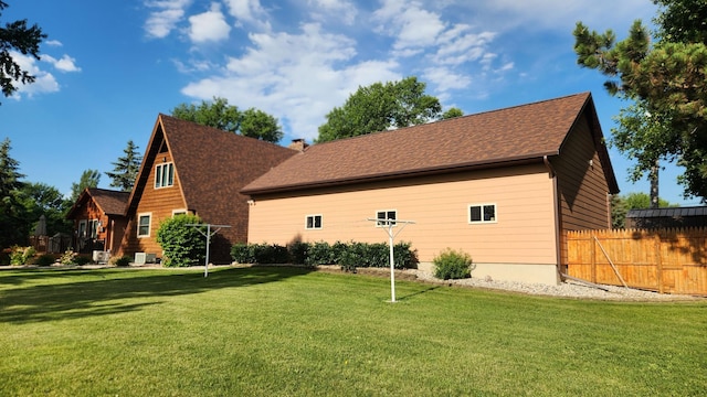 511 4th St W, Jasper, MN 56144 - view of home's exterior featuring roof with shingles