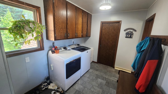 511 4th St W, Jasper, MN 56144 - laundry area featuring separate washer and dryer, cabinet space, and stone finish floors