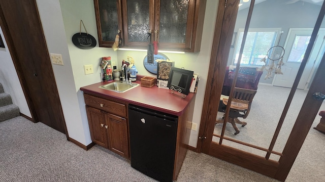511 4th St W, Jasper, MN 56144 - indoor bar with light carpet, fridge, and stairs
