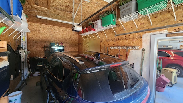 511 4th St W, Jasper, MN 56144 - garage with a garage door opener