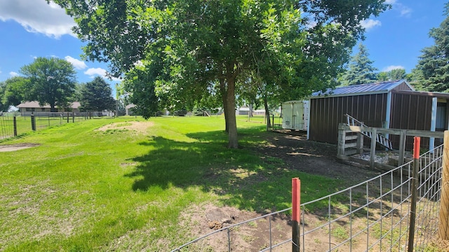 511 4th St W, Jasper, MN 56144 - view of yard featuring an outbuilding