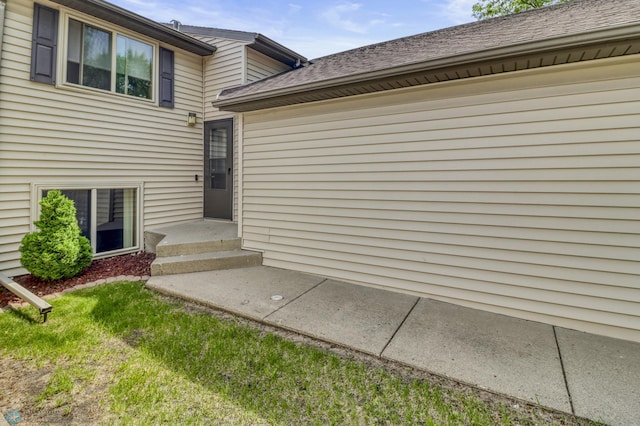 2744 32nd St S, Moorhead, MN 56560 - property entrance featuring a shingled roof