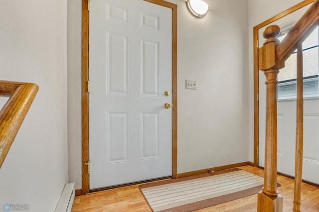 2744 32nd St S, Moorhead, MN 56560 - entrance foyer with light wood-style flooring and baseboard heating