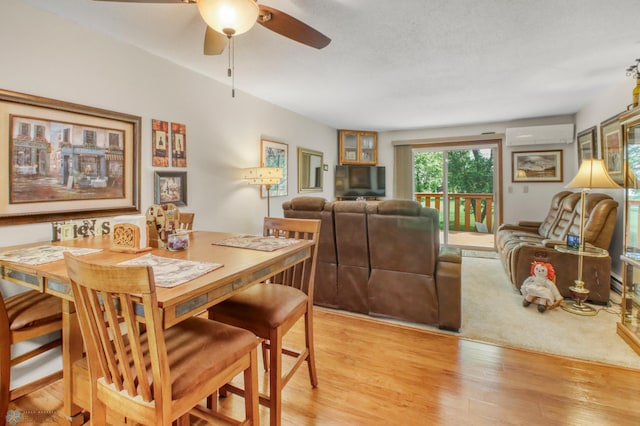 2744 32nd St S, Moorhead, MN 56560 - dining room with ceiling fan, light wood-style flooring, and a wall mounted AC