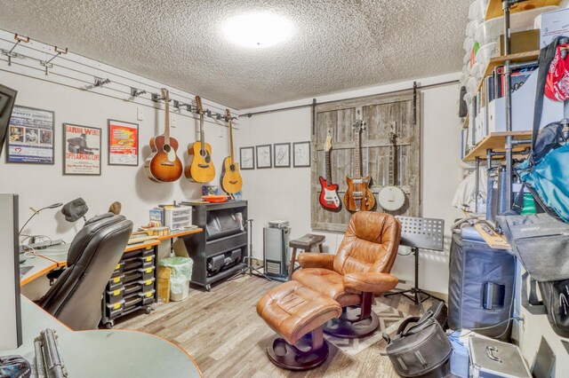 2744 32nd St S, Moorhead, MN 56560 - office area featuring a textured ceiling and wood finished floors