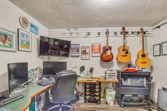 2744 32nd St S, Moorhead, MN 56560 - home office featuring a textured ceiling and wood finished floors