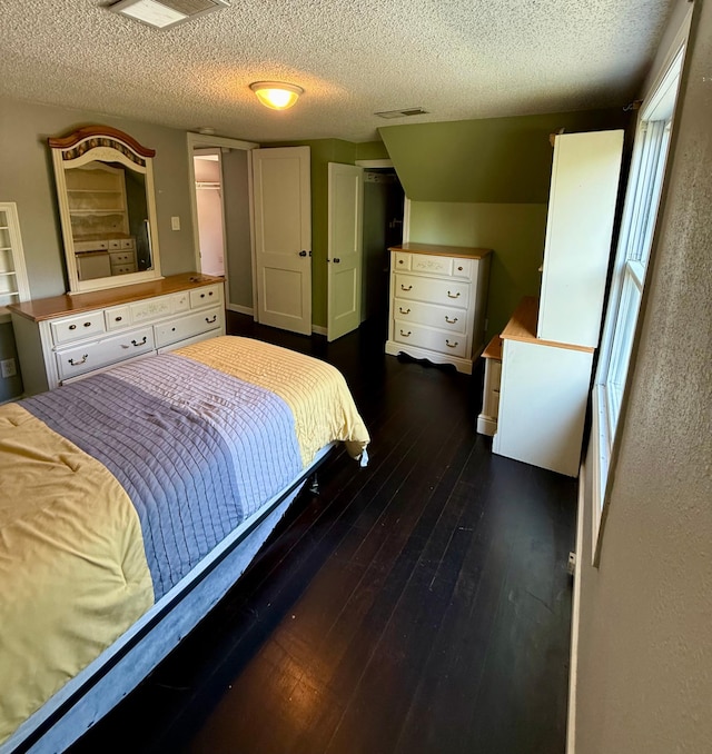 1212 Gorton Ave NW, Willmar, MN 56201 - bedroom featuring hardwood / wood-style flooring and a textured ceiling