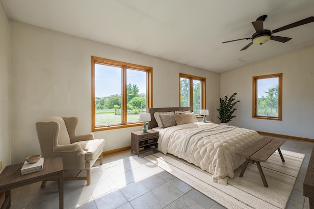21555 699th St, Wabasha, MN 55981 - bedroom with vaulted ceiling and light tile patterned floors