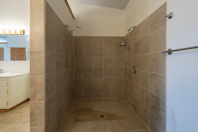 21555 699th St, Wabasha, MN 55981 - bathroom featuring vanity, tiled shower, and tile patterned flooring