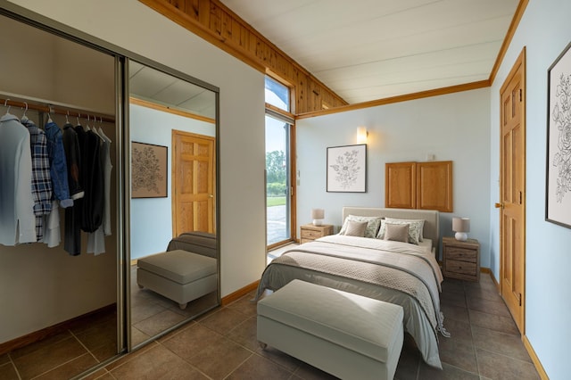 21555 699th St, Wabasha, MN 55981 - bedroom featuring access to outside, dark tile patterned floors, and lofted ceiling