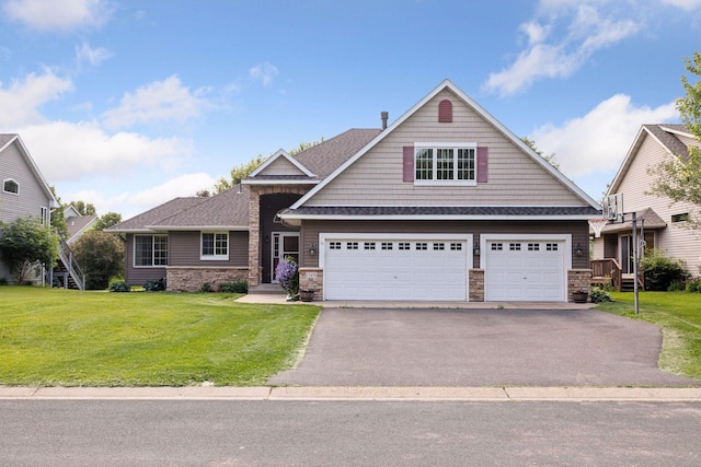 15450 Goodview Ave N, Hugo, MN 55038 - craftsman-style house featuring stone siding, asphalt driveway, and a front yard