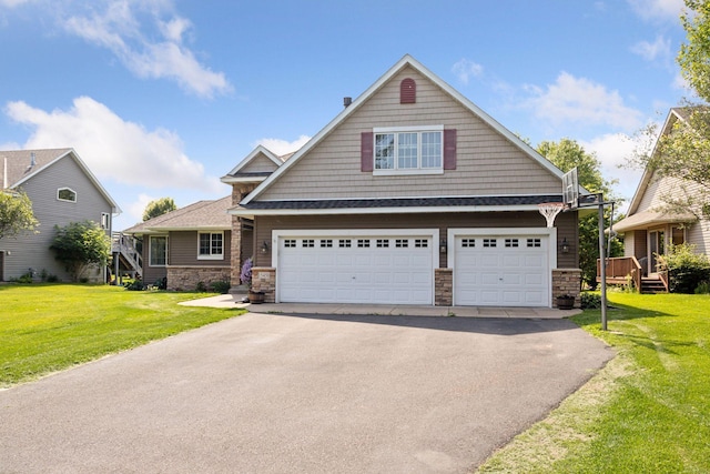 15450 Goodview Ave N, Hugo, MN 55038 - craftsman house with stone siding, asphalt driveway, and a front lawn