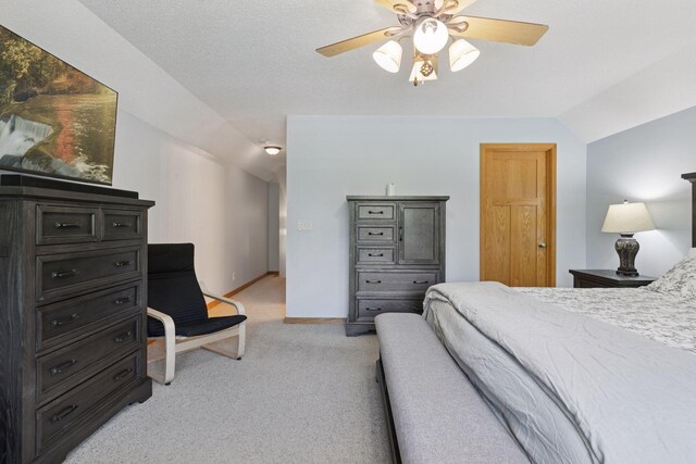 15450 Goodview Ave N, Hugo, MN 55038 - bedroom with vaulted ceiling, light colored carpet, and ceiling fan