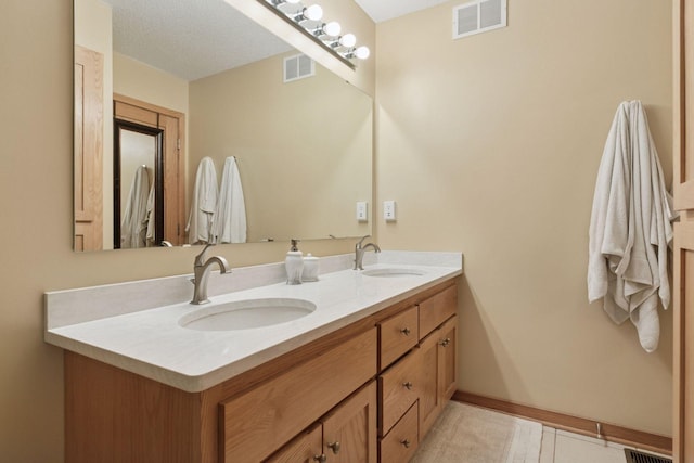 15450 Goodview Ave N, Hugo, MN 55038 - bathroom featuring double vanity