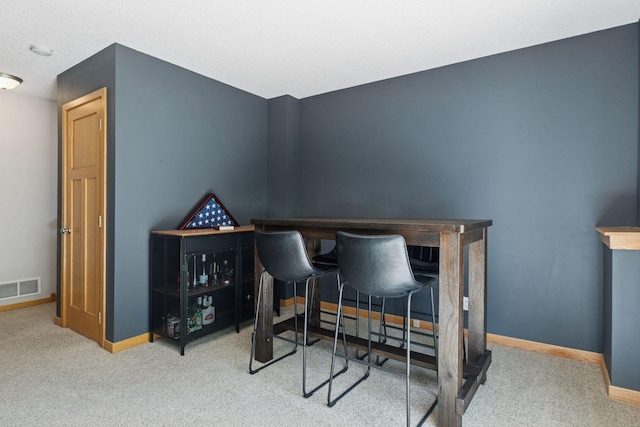 15450 Goodview Ave N, Hugo, MN 55038 - bar area with carpet and baseboards