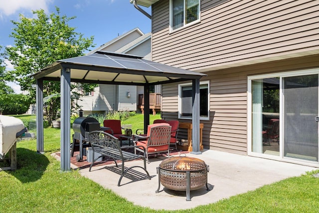 15450 Goodview Ave N, Hugo, MN 55038 - view of patio / terrace featuring an outdoor fire pit and a gazebo