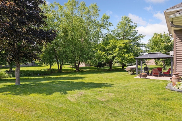 15450 Goodview Ave N, Hugo, MN 55038 - view of green lawn featuring a gazebo and a patio