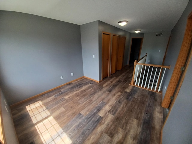 21196 Morgan Dr, Forest Lake, MN 55025 - spare room with wood finished floors and baseboards