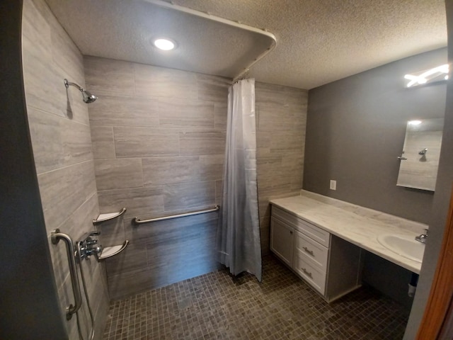 21196 Morgan Dr, Forest Lake, MN 55025 - full bath featuring tiled shower, a textured ceiling, tile patterned floors, and vanity