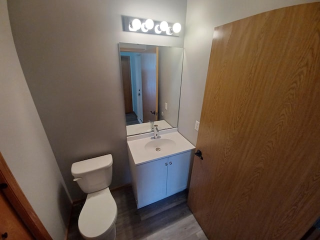 21196 Morgan Dr, Forest Lake, MN 55025 - half bathroom with wood finished floors and vanity
