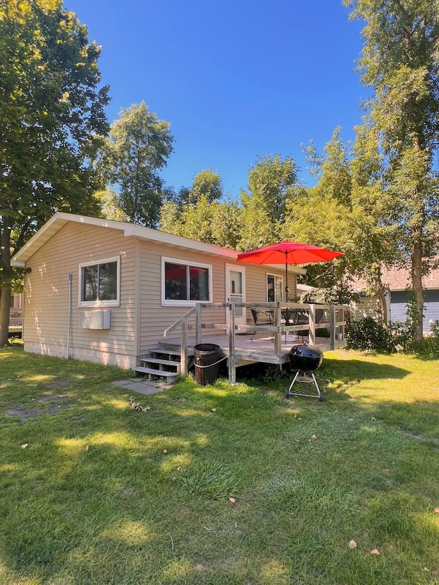 35686 Rush Lake Loop Unit 8, Ottertail, MN 56571 - back of house featuring a yard and a wooden deck