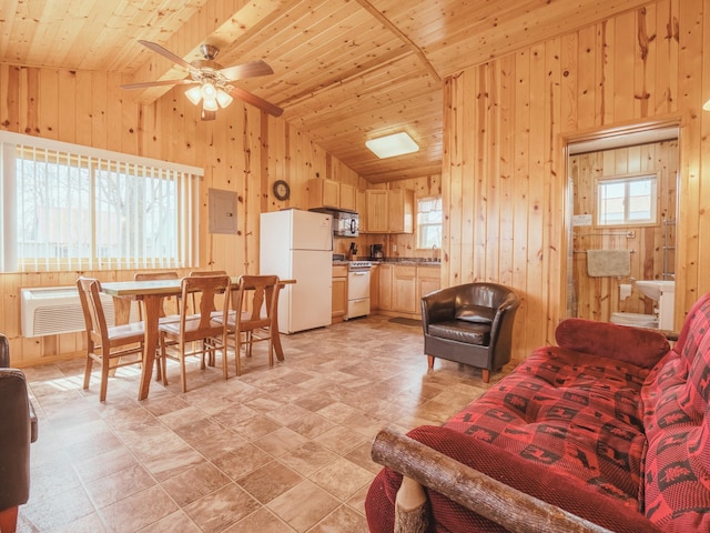 35686 Rush Lake Loop Unit 8, Ottertail, MN 56571 - living room featuring wooden walls, lofted ceiling, wooden ceiling, and ceiling fan