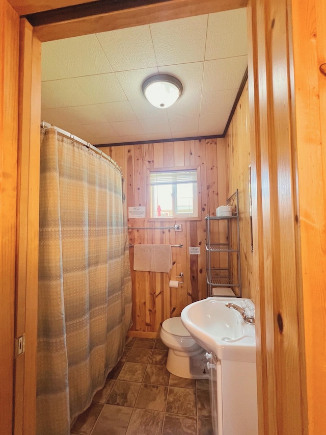 35686 Rush Lake Loop Unit 8, Ottertail, MN 56571 - full bathroom with wooden walls and a shower with curtain