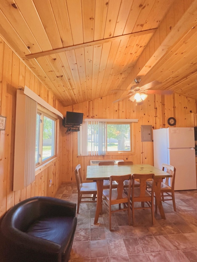 35686 Rush Lake Loop Unit 8, Ottertail, MN 56571 - dining area with wood walls, vaulted ceiling, wood ceiling, and ceiling fan