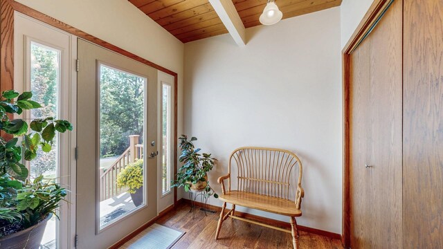 6317 Oak Meadow Ln NW, Rochester, MN 55901 - doorway to outside featuring wood finished floors and a wooden ceiling with exposed beams