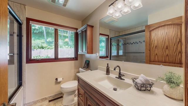 6317 Oak Meadow Ln NW, Rochester, MN 55901 - full bathroom with vanity and shower / bath combination with glass door