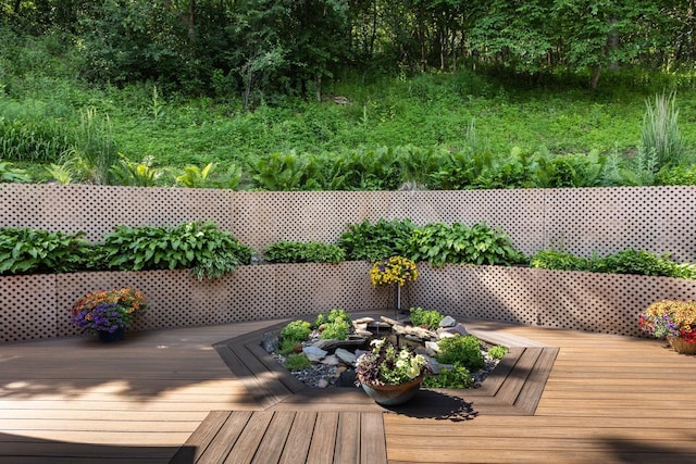 6317 Oak Meadow Ln NW, Rochester, MN 55901 - wooden deck featuring a fire pit