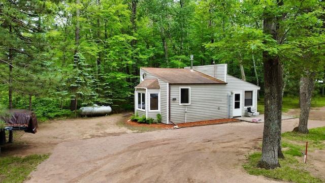 87102 Alder Loop, Sturgeon Lake, MN 55783 - view of front of home featuring driveway and a shingled roof