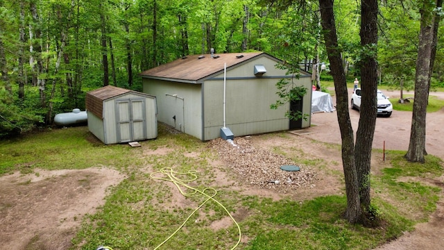87102 Alder Loop, Sturgeon Lake, MN 55783 - view of home's exterior featuring a storage shed