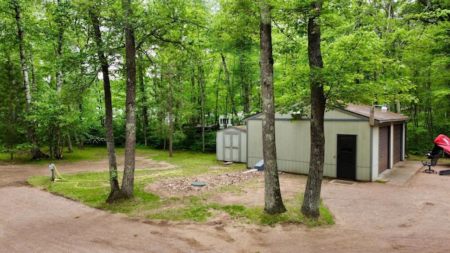 87102 Alder Loop, Sturgeon Lake, MN 55783 - view of yard with a storage shed