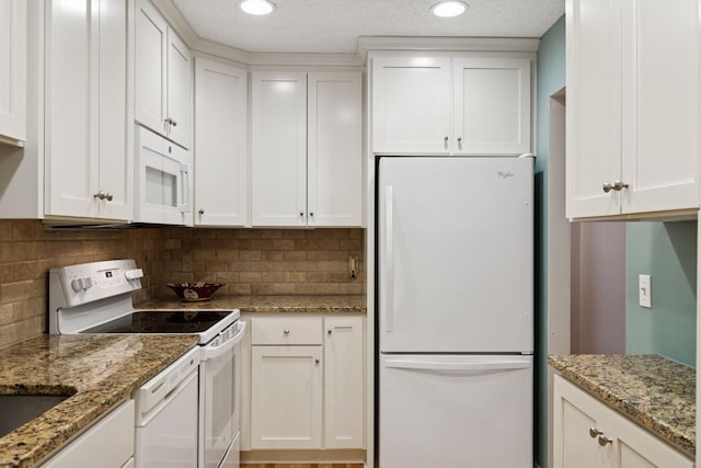 8447 Morgan Ln, Eden Prairie, MN 55347 - kitchen with white appliances, white cabinets, backsplash, light stone countertops, and recessed lighting