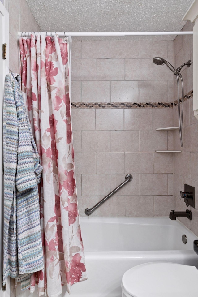 8447 Morgan Ln, Eden Prairie, MN 55347 - full bath featuring shower / bath combo with shower curtain and a textured ceiling