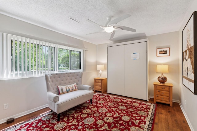 8447 Morgan Ln, Eden Prairie, MN 55347 - sitting room featuring wood finished floors, ceiling fan, and a textured ceiling