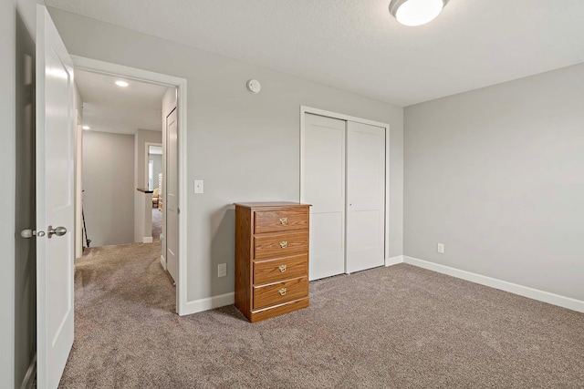 14145 Aberdeen Way, Rosemount, MN 55068 - unfurnished bedroom with carpet flooring and a closet