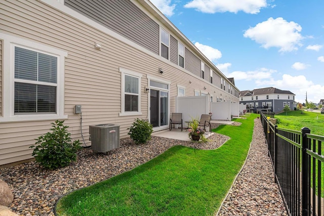 14145 Aberdeen Way, Rosemount, MN 55068 - back of house featuring a patio, a fenced backyard, and a residential view