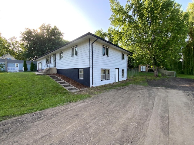511 2nd St S, Watkins, MN 55389 - view of front of property with a front lawn