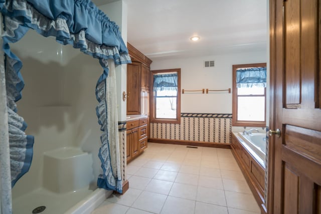 1757 325th Ave, West Sweden Twp, WI 54837 - full bath featuring a shower stall, a garden tub, tile patterned flooring, and recessed lighting