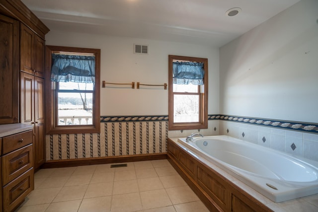 1757 325th Ave, West Sweden Twp, WI 54837 - full bathroom with a garden tub, wainscoting, and tile patterned floors