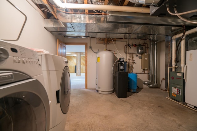 1757 325th Ave, West Sweden Twp, WI 54837 - unfinished below grade area with washing machine and clothes dryer, water heater, a water pressure tank, and heating unit