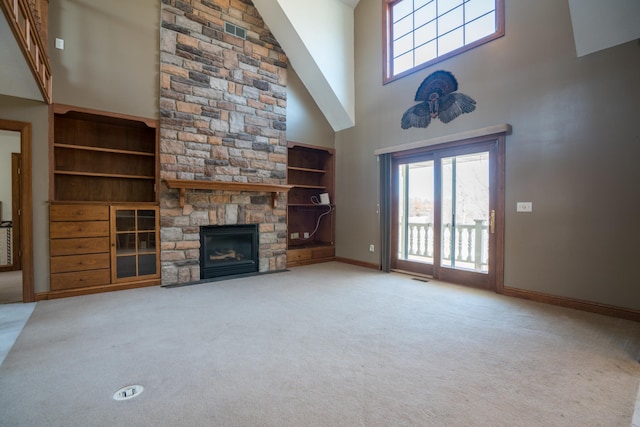 1757 325th Ave, West Sweden Twp, WI 54837 - unfurnished living room featuring a high ceiling, carpet floors, and a fireplace