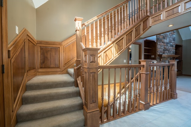 1757 325th Ave, West Sweden Twp, WI 54837 - stairway featuring high vaulted ceiling and tile patterned flooring