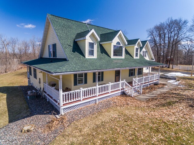 1757 325th Ave, West Sweden Twp, WI 54837 - farmhouse-style home with covered porch and a shingled roof