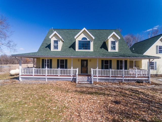 1757 325th Ave, West Sweden Twp, WI 54837 - farmhouse-style home with a porch and roof with shingles